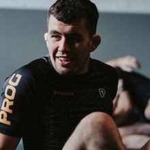 Load image into Gallery viewer, Progress Sportif Rashguard- Orange